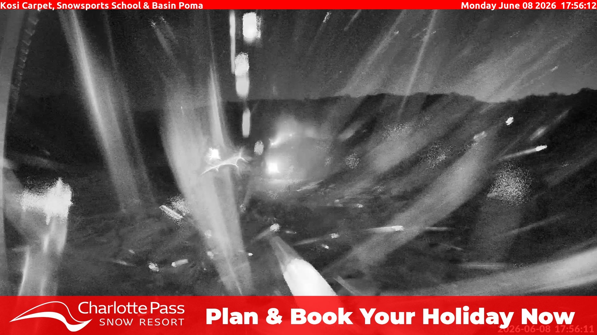 Charlotte Pass Kosi Carpet, Snowsports School and Basin Poma snow cam captured at 8 June 2026 at 6:22 pm AEST