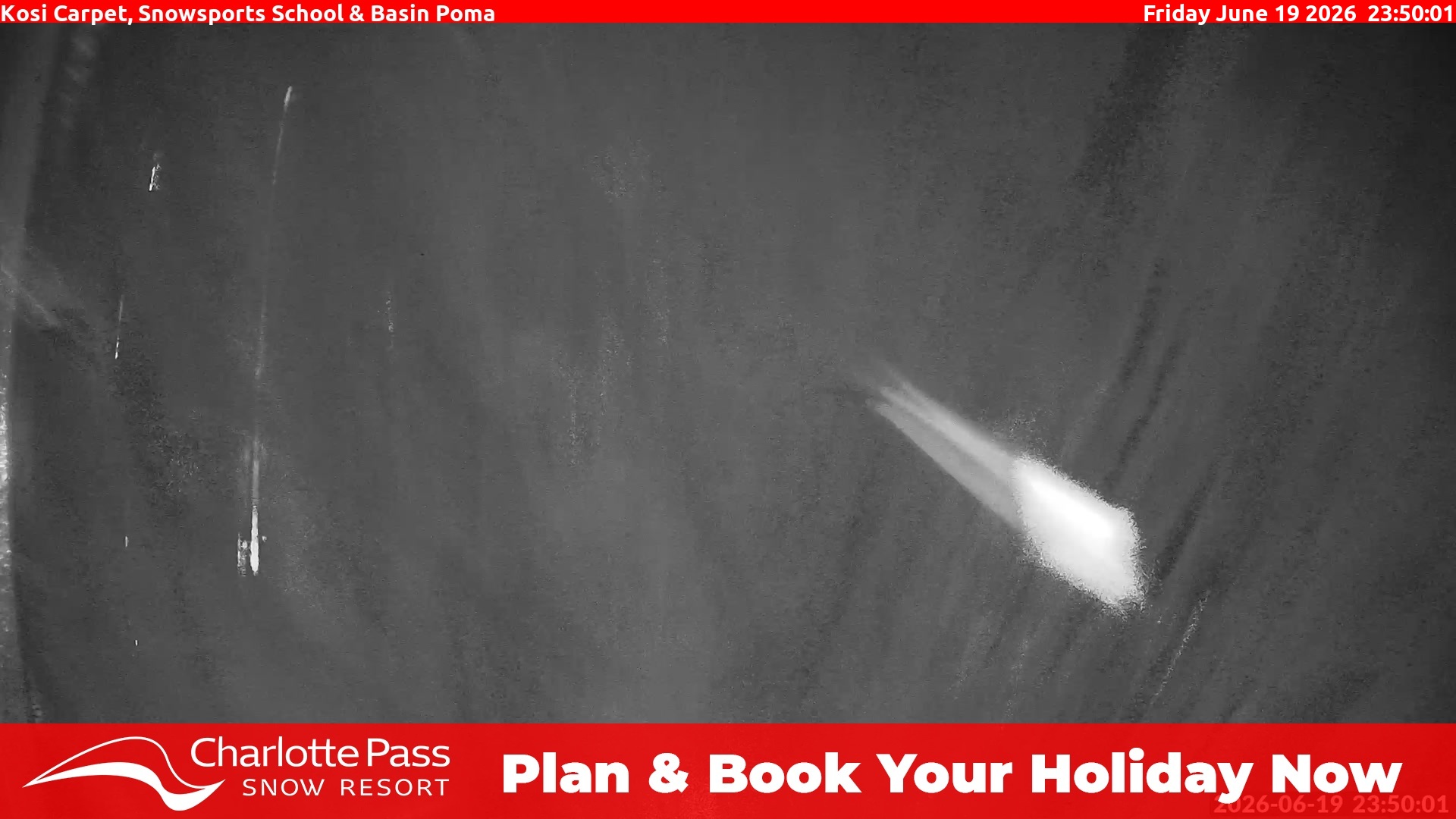 Charlotte Pass Kosi Carpet, Snowsports School and Basin Poma snow cam captured at 19 June 2026 at 11:54 pm AEST