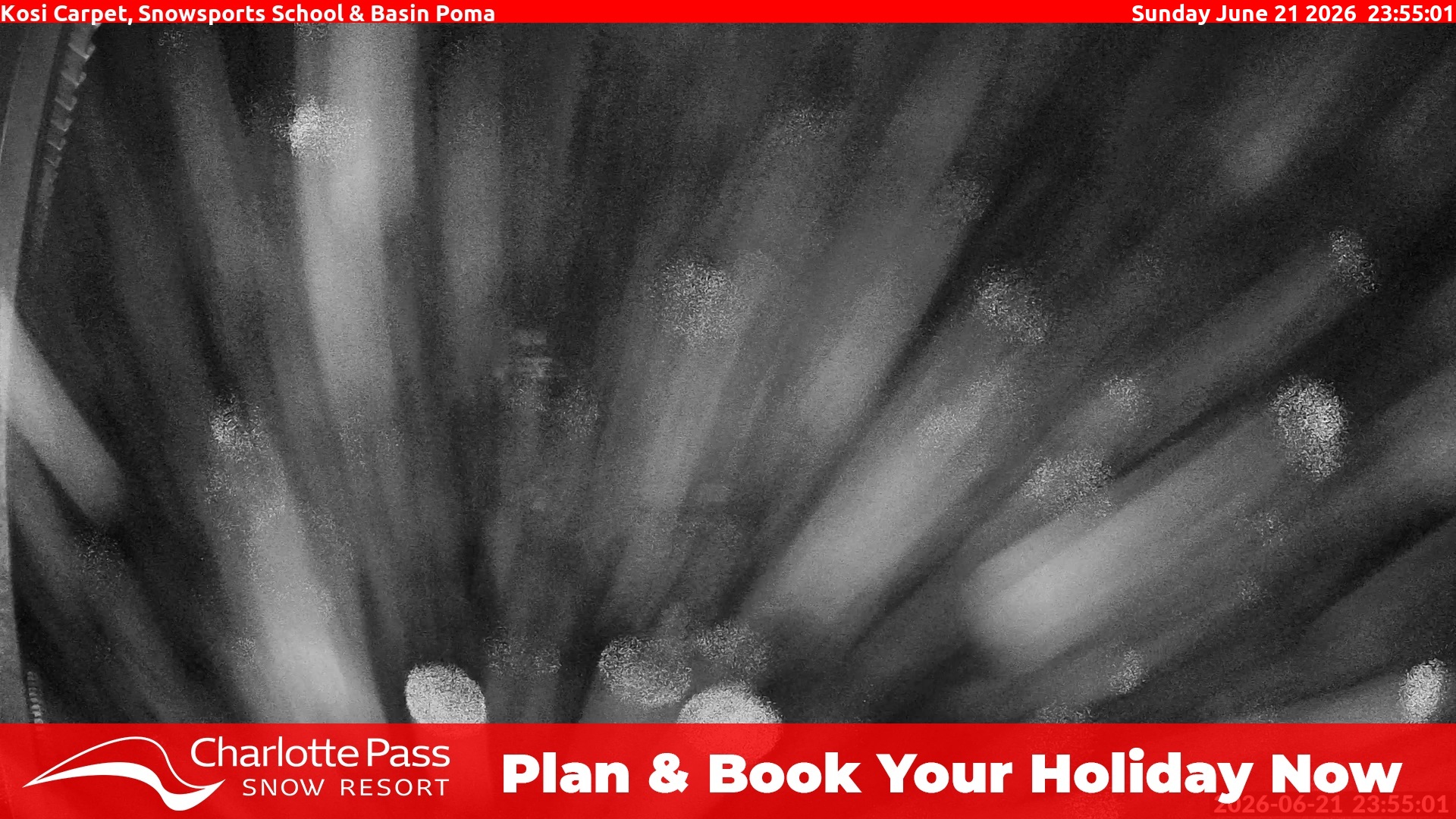 Charlotte Pass Kosi Carpet, Snowsports School and Basin Poma snow cam captured at 21 June 2026 at 11:58 pm AEST