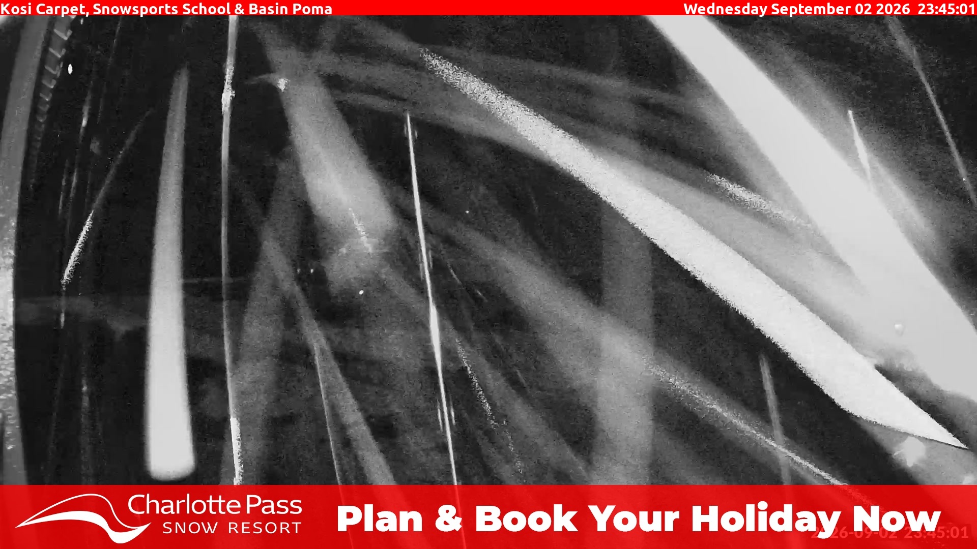 Charlotte Pass Kosi Carpet, Snowsports School and Basin Poma snow cam captured at 2 September 2026 at 11:49 pm AEST
