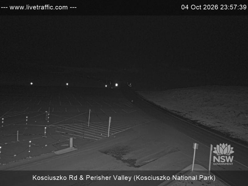 Perisher Perisher Valley Car Park Road snow cam captured at 4 October 2026 at 11:57 pm AEDT