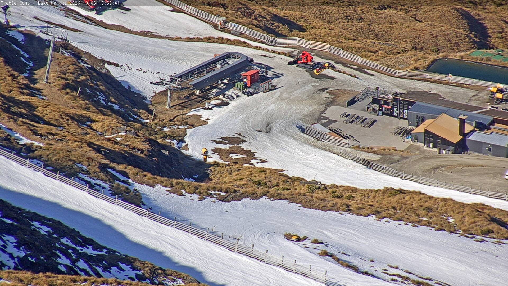 Treble Cone Base Building snow cam captured at 3 October 2026 at 4:44 pm NZDT