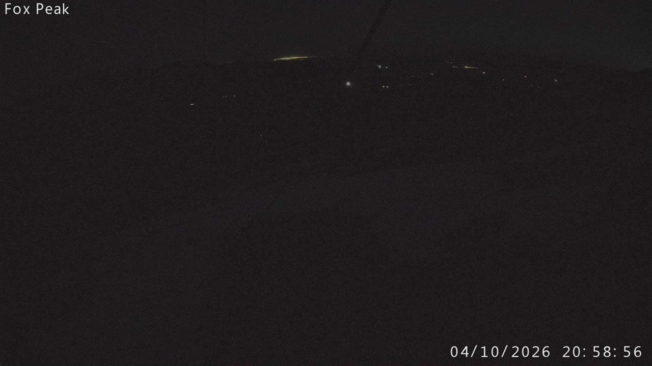 Fox Peak Apex South East snow cam captured at 4 October 2026 at 9:04 pm NZDT