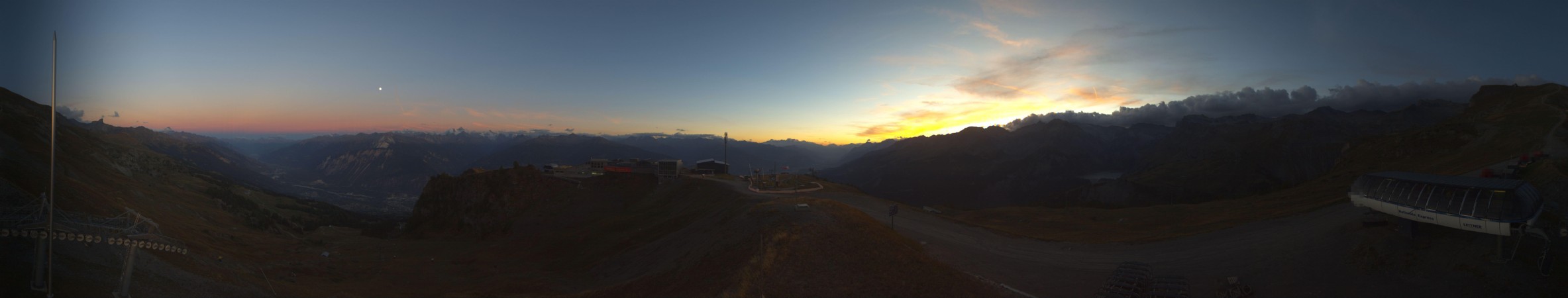 Crans Montana RM (CMA) SA La Nationale snow cam captured at 23 September 2026 at 7:53 pm GMT+2