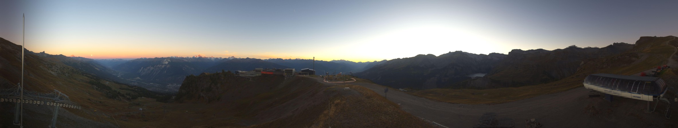 Crans Montana RM (CMA) SA La Nationale snow cam captured at 26 September 2026 at 7:38 pm GMT+2