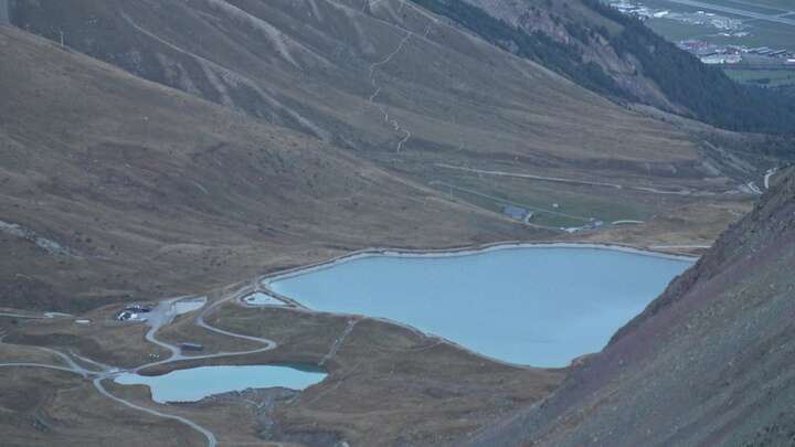 St. Moritz Piz Nair Upper Station snow cam captured at 28 September 2026 at 7:24 pm GMT+2