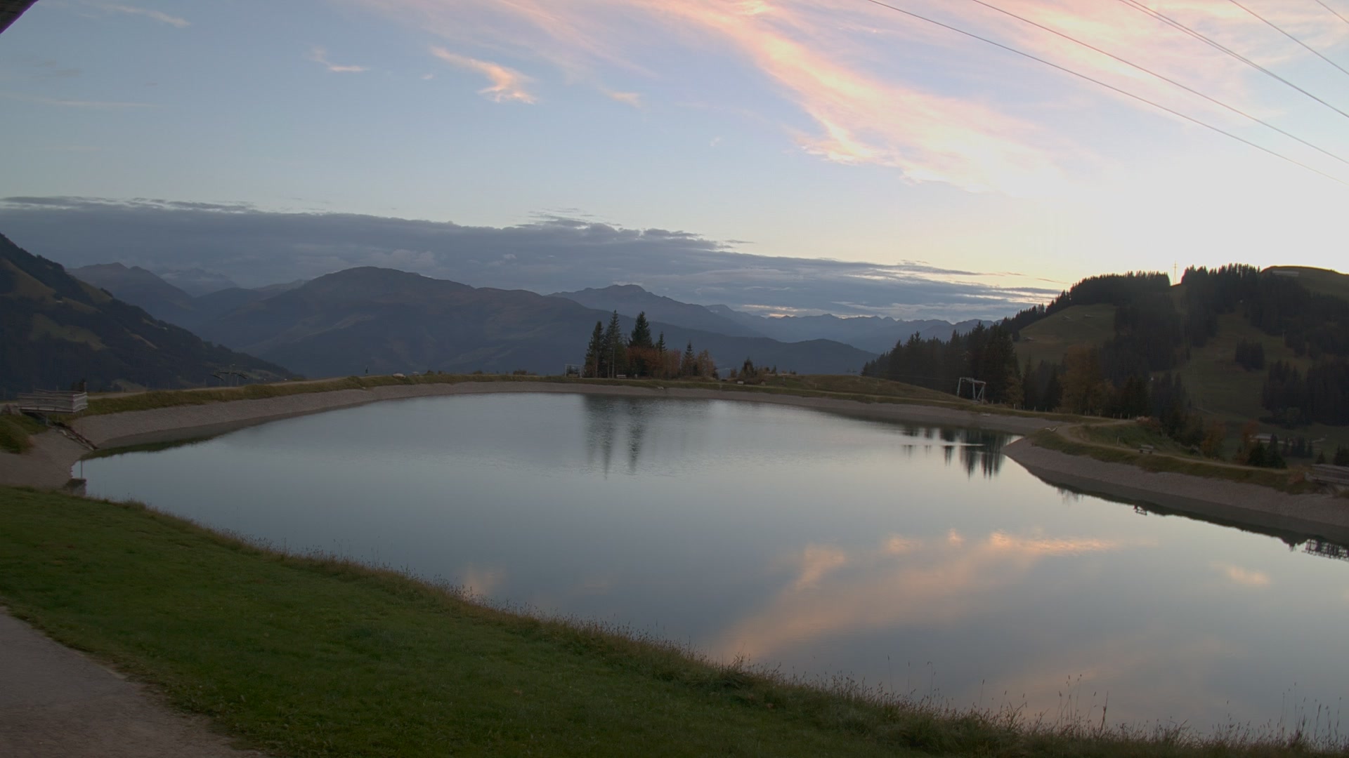 Brixen im Thale (SkiWelt) Brantlalmsee snow cam captured at 5 October 2026 at 6:47 pm GMT+2