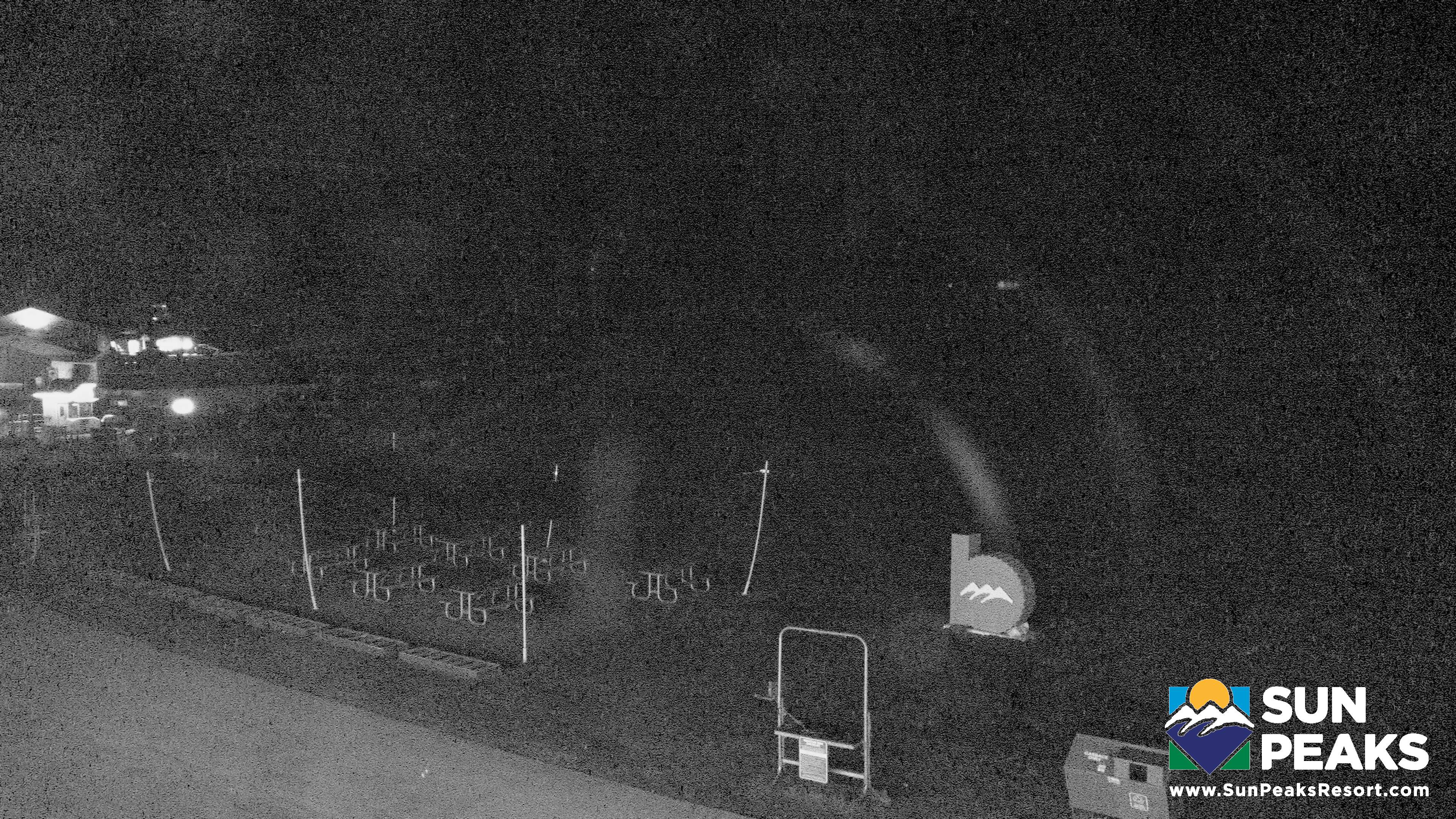 Sun Peaks Village Day Lodge Slopeside snow cam captured at 4 October 2026 at 11:59 pm GMT-7